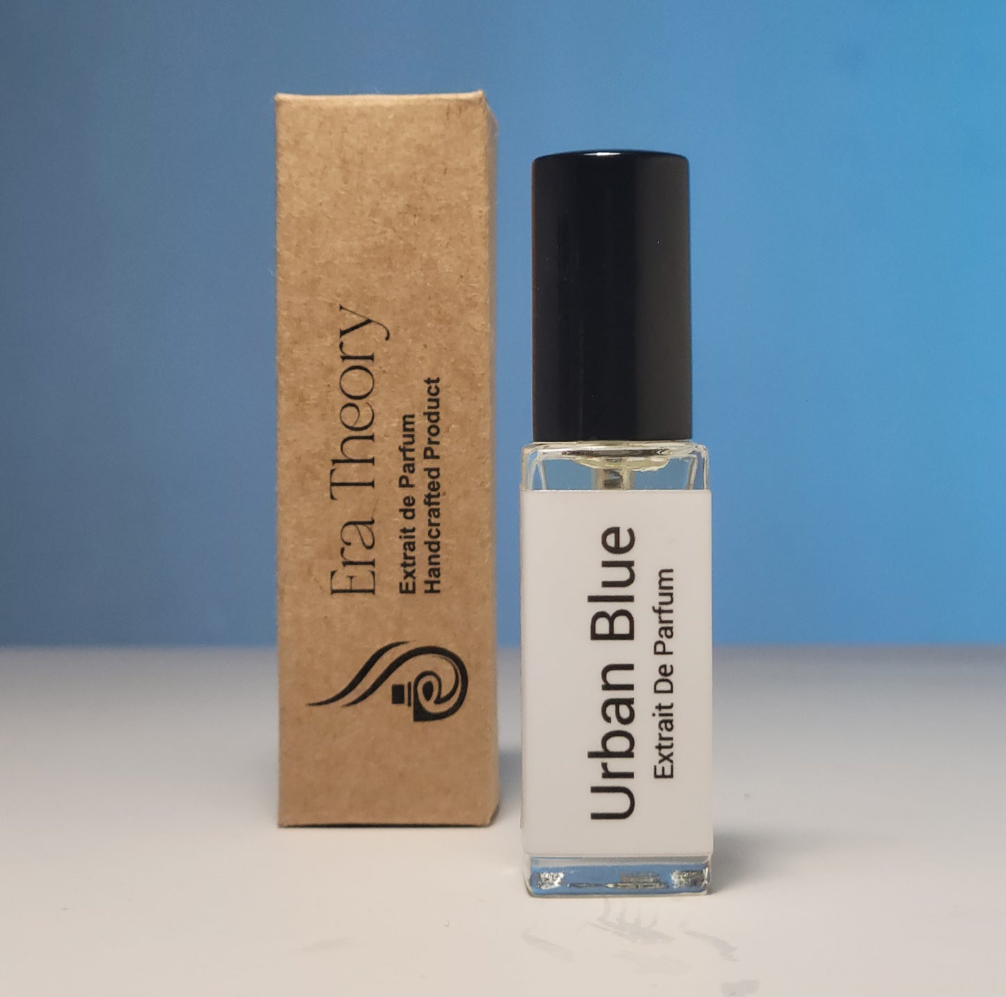 Discover Urban Blue, a woody aromatic perfume inspired by Bleu de Chanel. A sophisticated blend of zesty grapefruit, ginger, and smoky incense. Handcrafted by Era Theory.