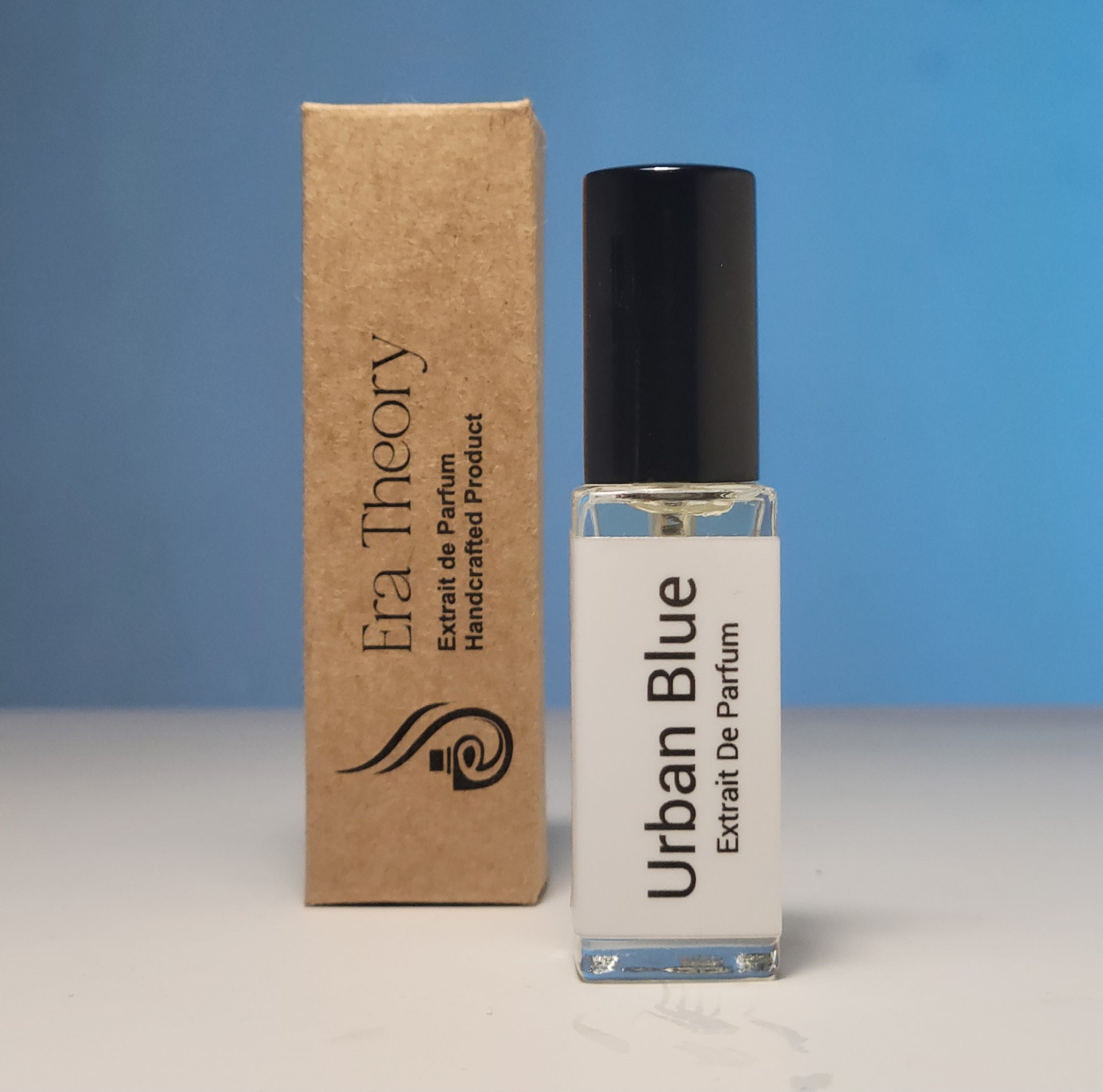 Discover Urban Blue, a woody aromatic perfume inspired by Bleu de Chanel. A sophisticated blend of zesty grapefruit, ginger, and smoky incense. Handcrafted by Era Theory.