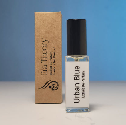Discover Urban Blue, a woody aromatic perfume inspired by Bleu de Chanel. A sophisticated blend of zesty grapefruit, ginger, and smoky incense. Handcrafted by Era Theory.