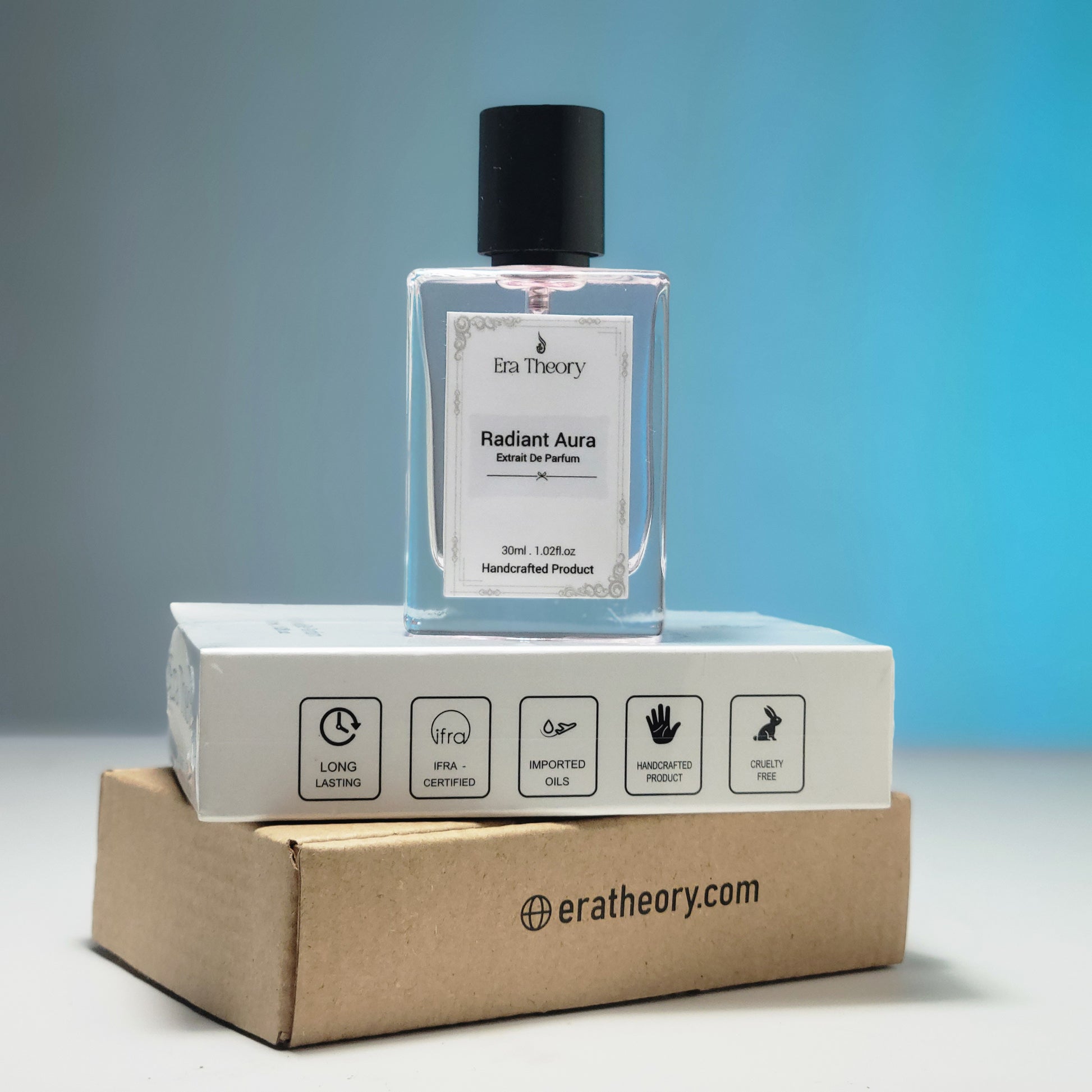 Era Theory “Radiant Aura” inspired by Bombshell — bright fruity-floral perfume bottle with peony and passionfruit notes.