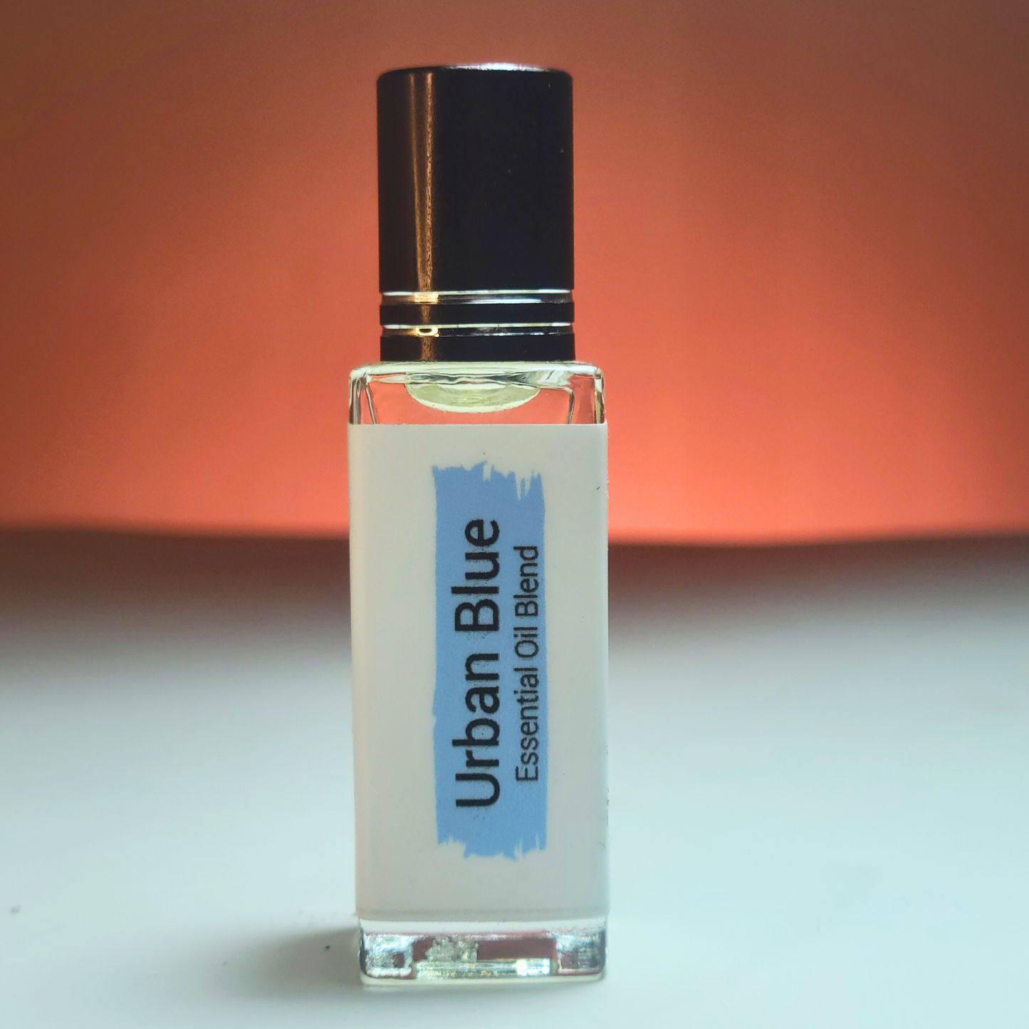 Discover Urban Blue, a woody aromatic perfume inspired by Bleu de Chanel. A sophisticated blend of zesty grapefruit, ginger, and smoky incense. Handcrafted by Era Theory.