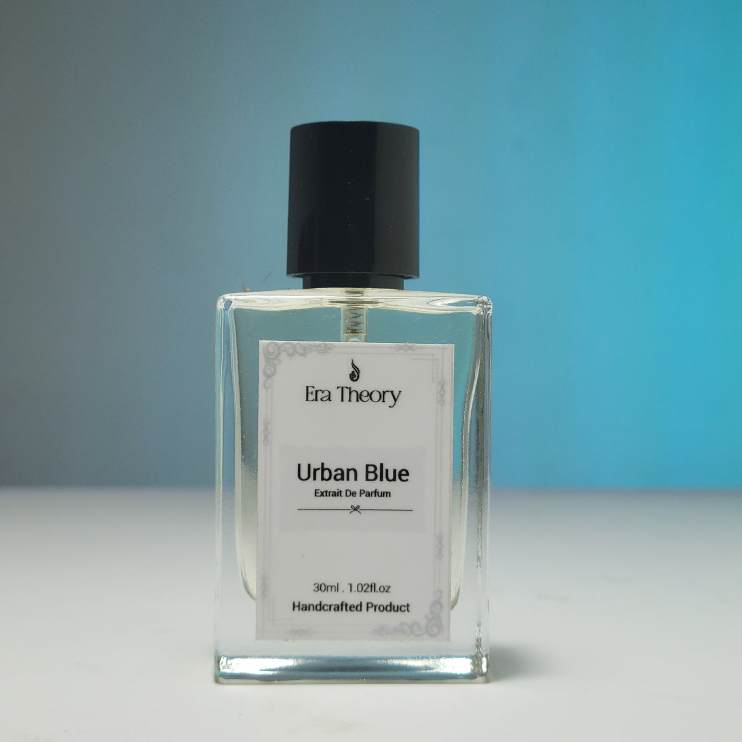 Discover Urban Blue, a woody aromatic perfume inspired by Bleu de Chanel. A sophisticated blend of zesty grapefruit, ginger, and smoky incense. Handcrafted by Era Theory.
