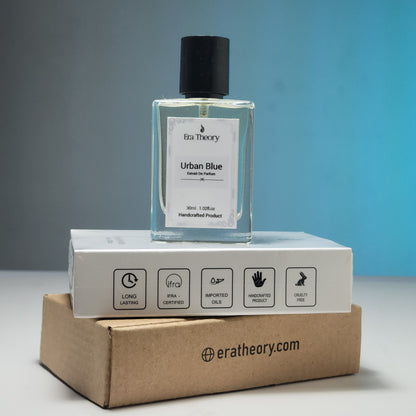 Discover Urban Blue, a woody aromatic perfume inspired by Bleu de Chanel. A sophisticated blend of zesty grapefruit, ginger, and smoky incense. Handcrafted by Era Theory.